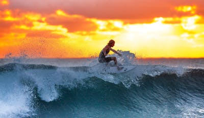 surfer wave sunset the indian ocean 390051 1 Costa Rica Itinerary