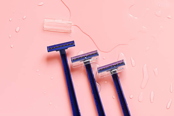 Disposable razors in waterdrops.