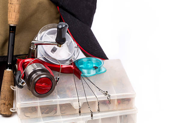 fishing tackles rod, reel, line and lure in box. Prepare fishing journey